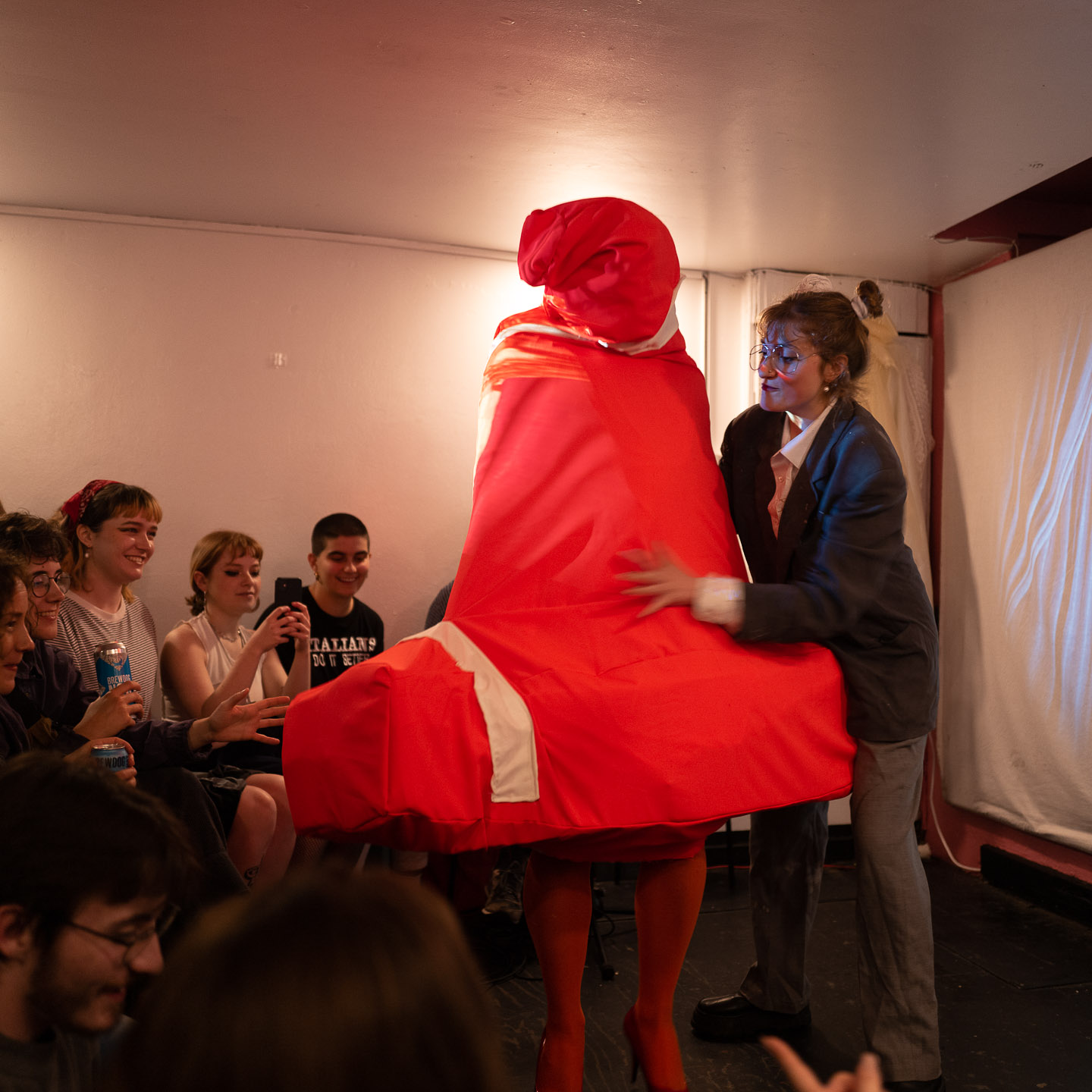 A human-sized traffic cone